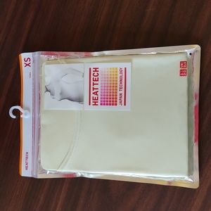 XS light green heattech scoop neck Long sleeve from Uniqlo